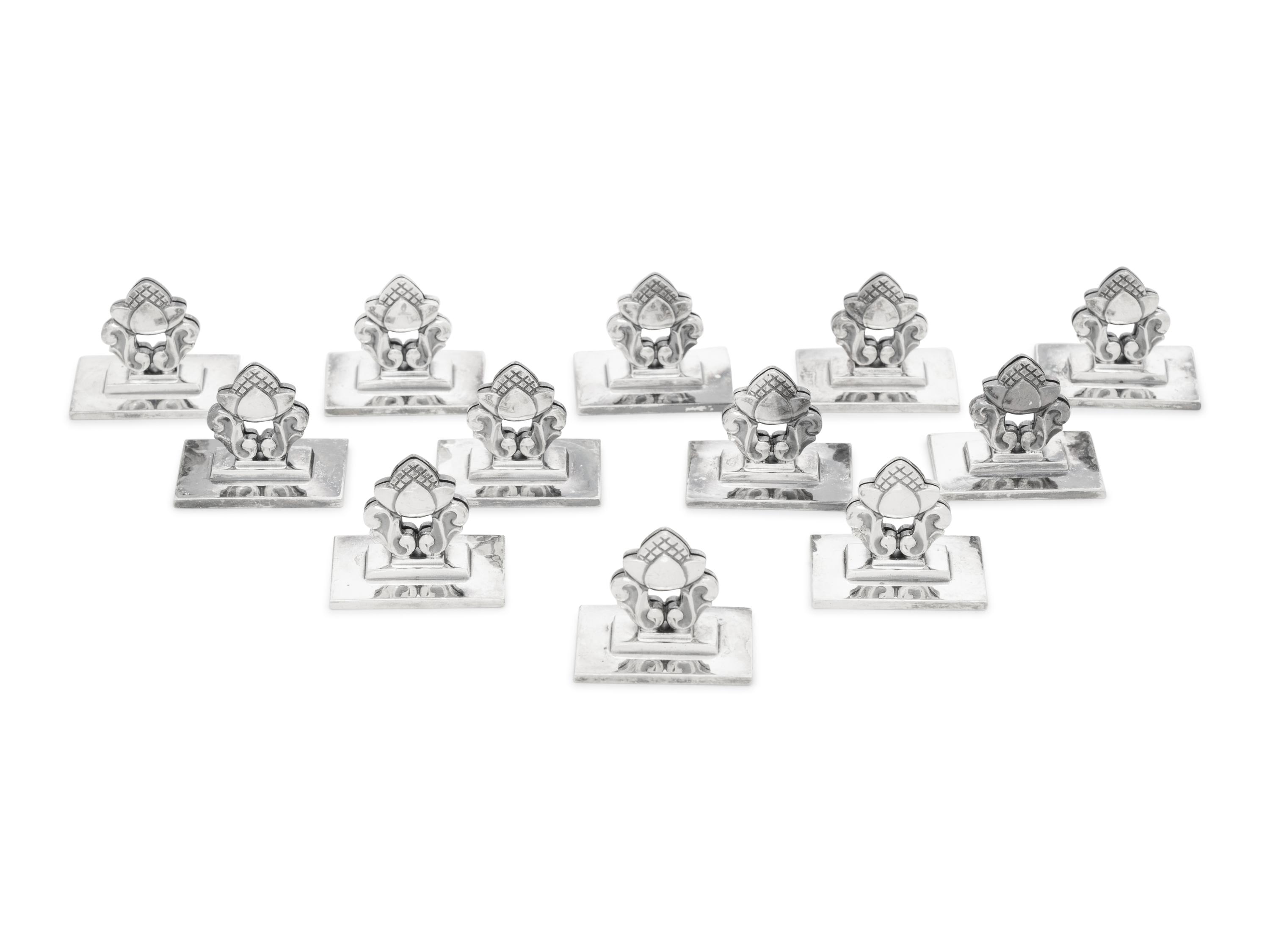 A Set of Twelve Georg Jensen Silver Acorn Place Card Holders