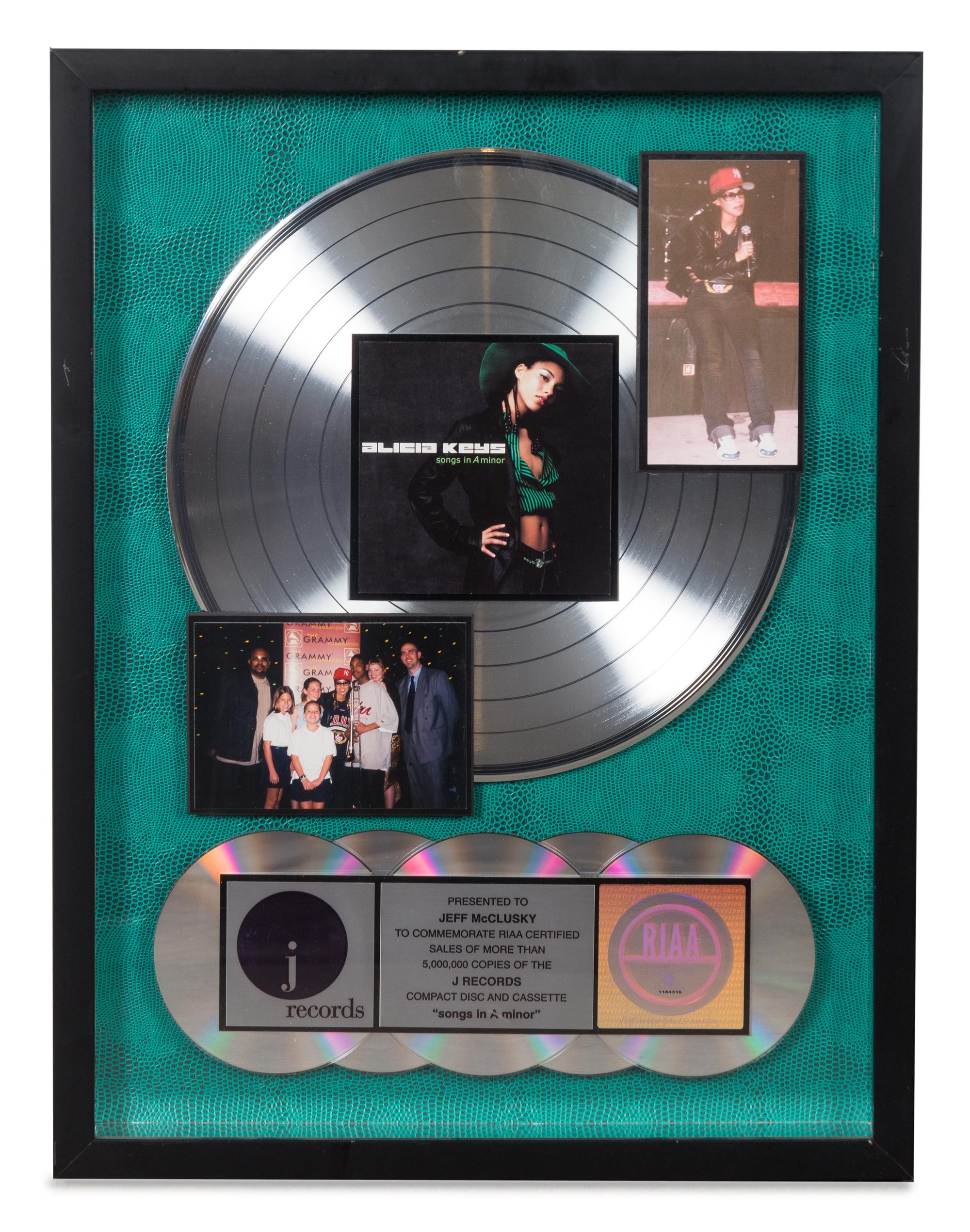 An Alicia Keys: Songs in A Minor RIAA Certified 5x Platinum Presentation Album Height 21 x 16 inches.