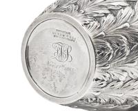 An Assembled American Eight-Piece Repoussé Silver Tea and Coffee Service