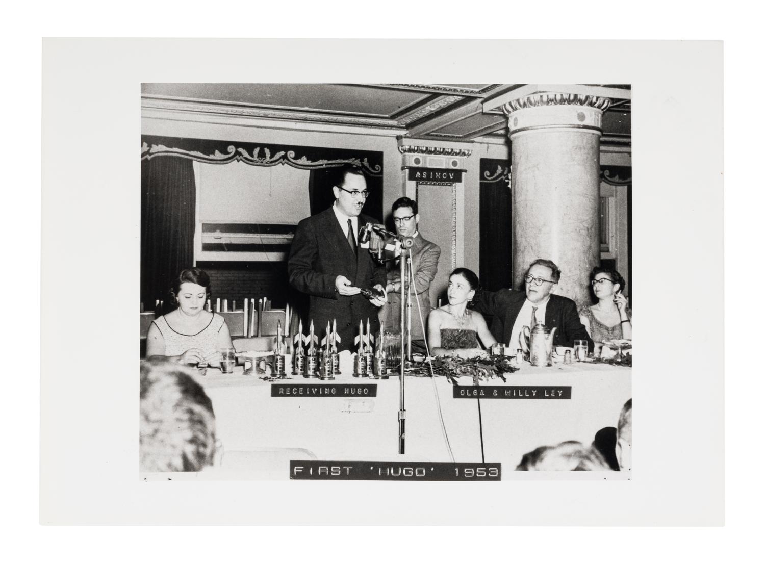 [HUGO AWARDS]. Award given to Forrest J. Ackerman by Isaac Asimov at the 11th WorldCon. 1953