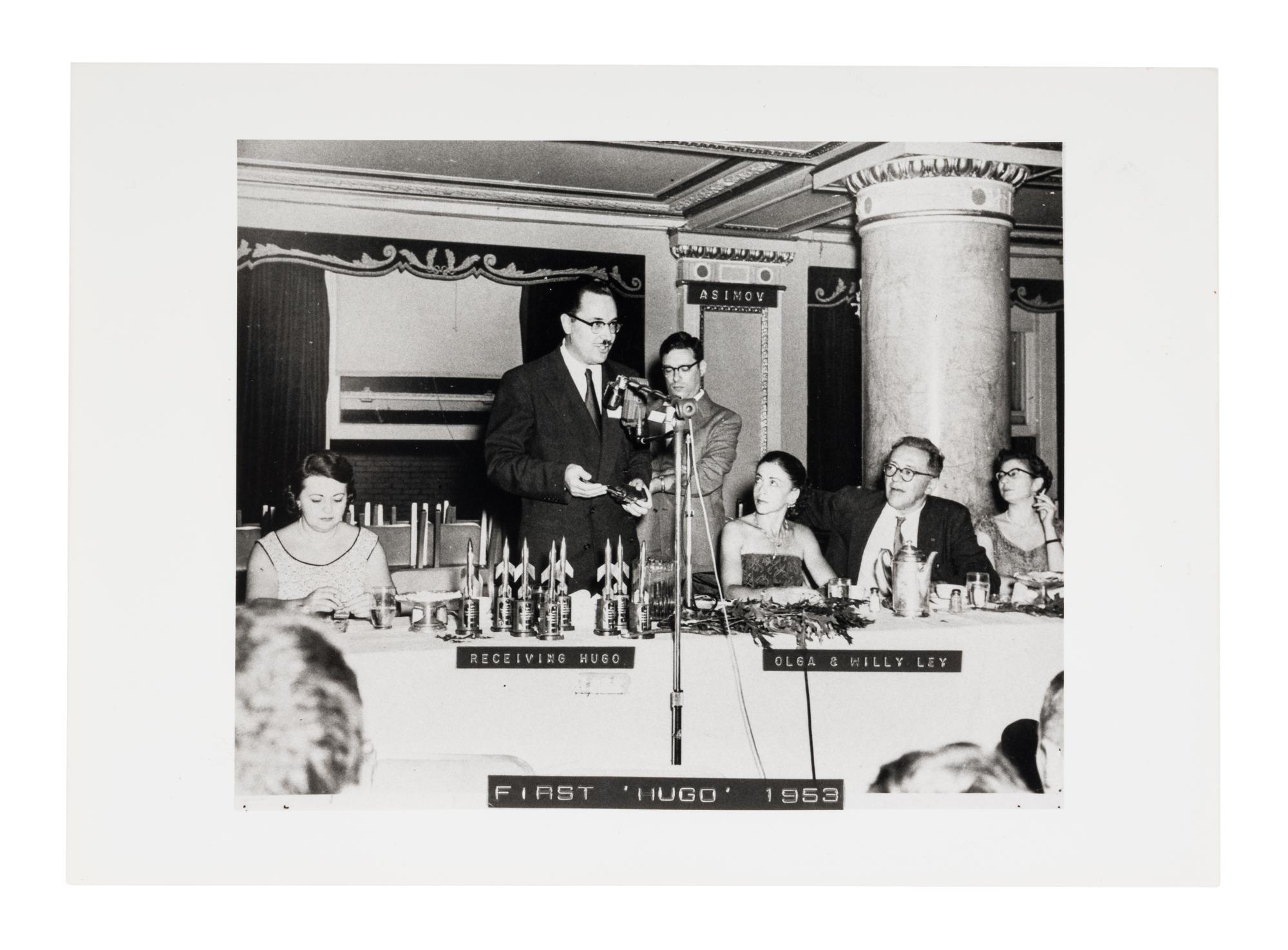 [HUGO AWARDS]. Award given to Forrest J. Ackerman by Isaac Asimov at the 11th WorldCon. 1953