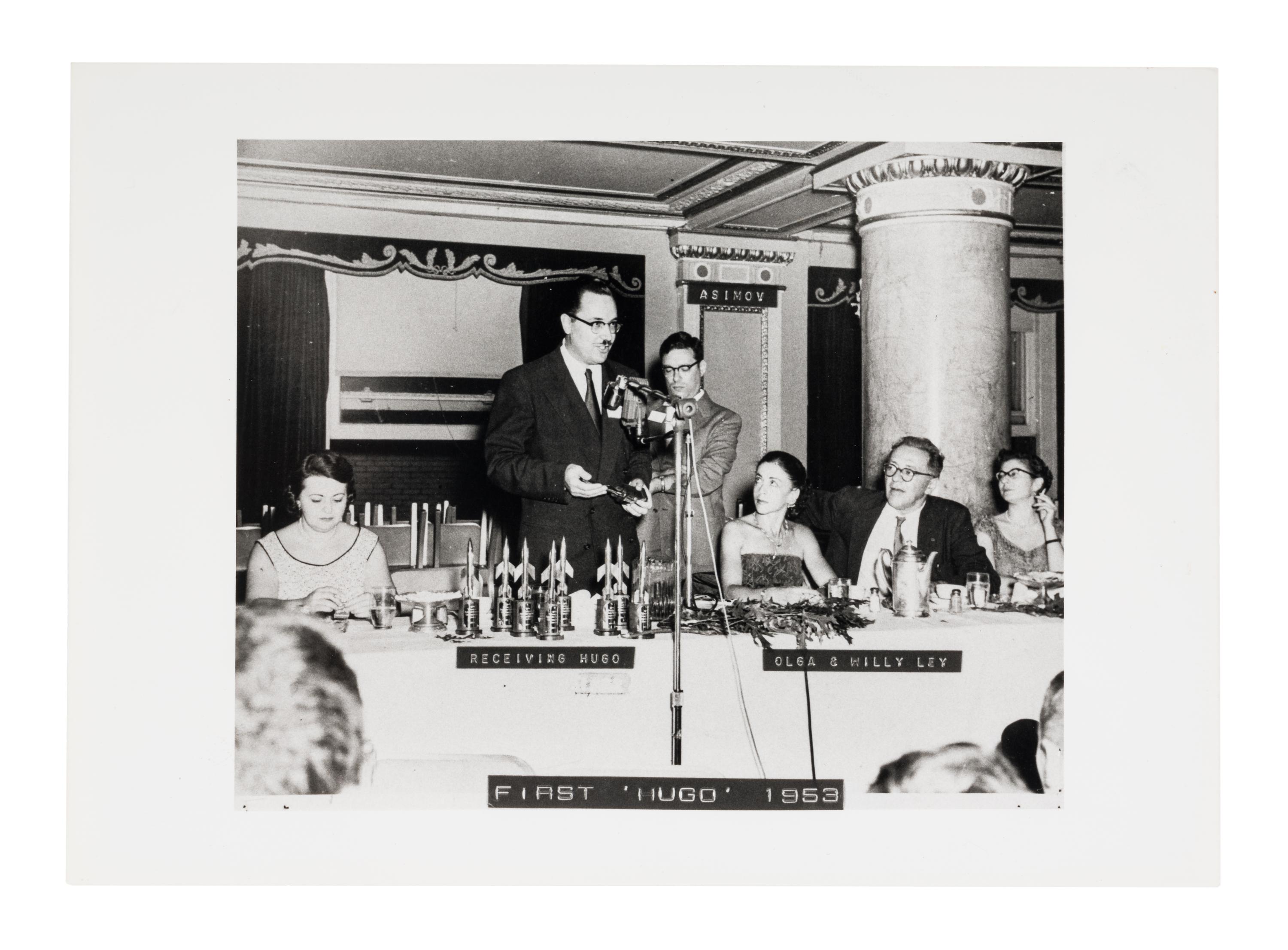 [HUGO AWARDS]. Award given to Forrest J. Ackerman by Isaac Asimov at the 11th WorldCon. 1953