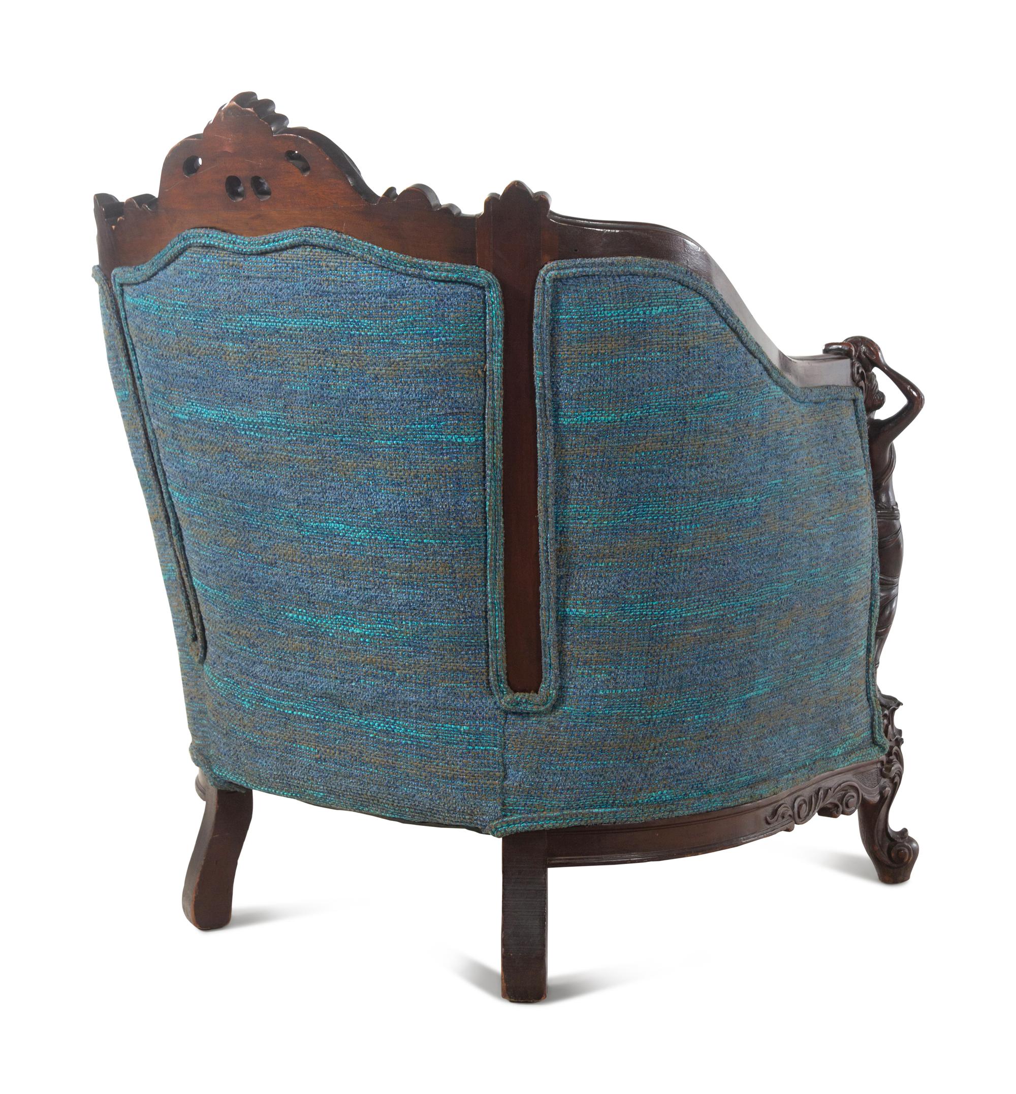 A Pair of Carved Walnut Armchairs in the Style of Karpen Bros.