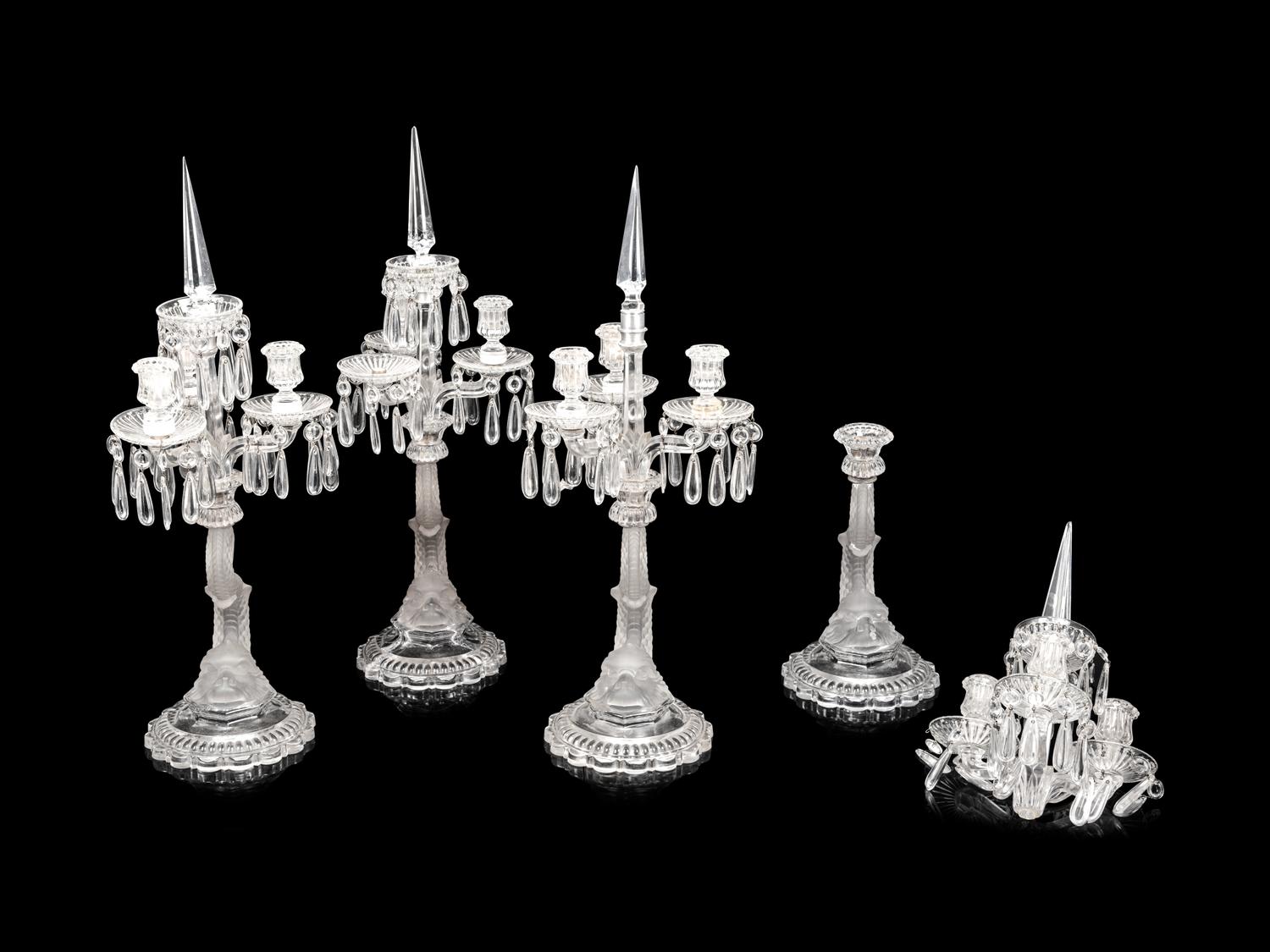 A Set of Four Baccarat Dauphin Three-Light Candelabra