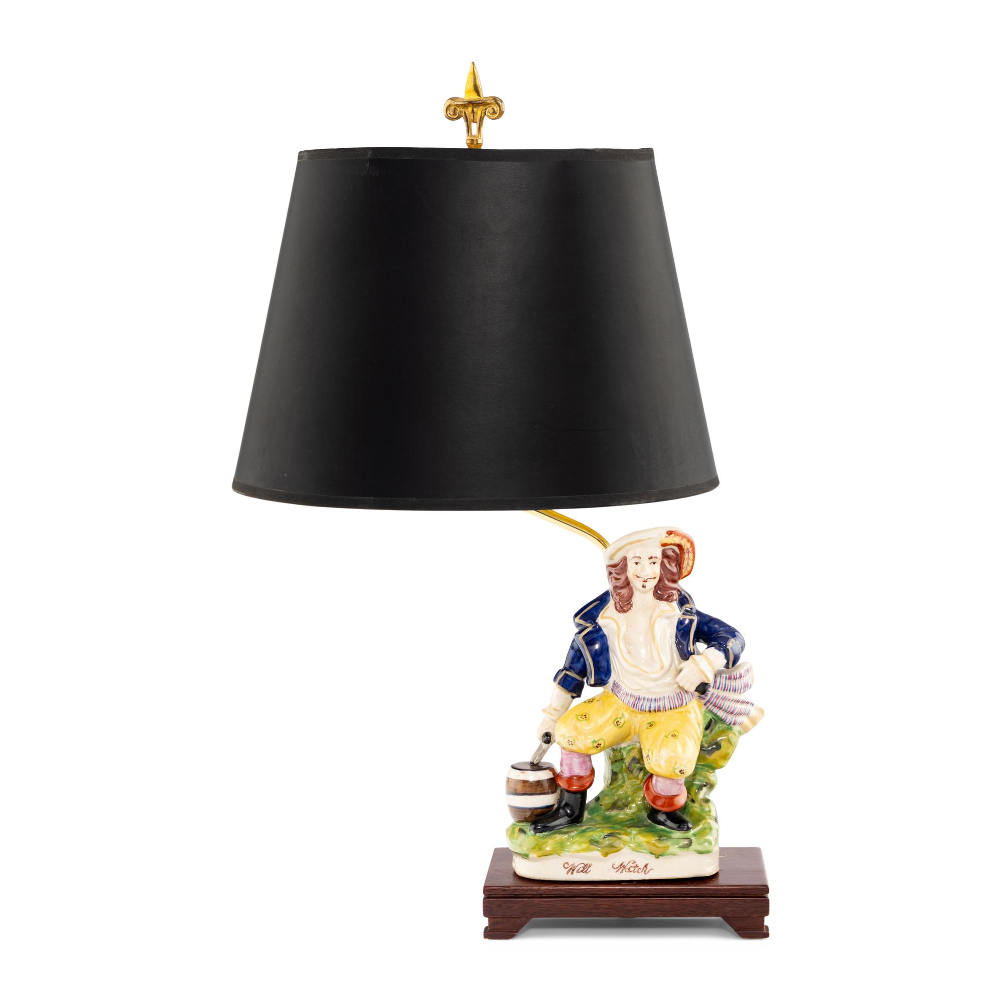 A Polychrome Glazed Pottery Figure Mounted as a Lamp