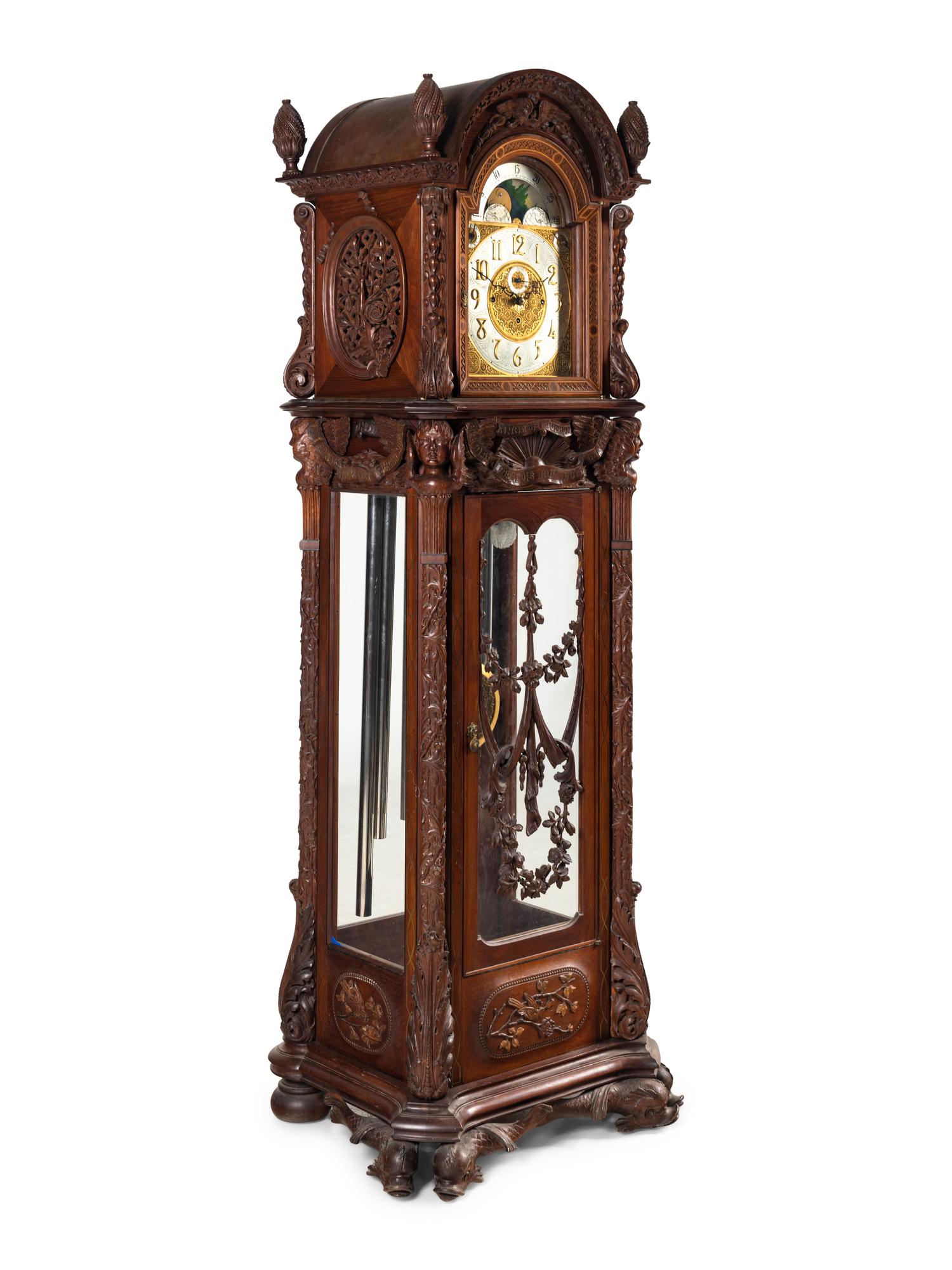 A Renaissance Revival Carved Mahogany Tube-Striking Tall Case Clock