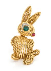 An 18 Karat Yellow Gold, Emerald, Diamond and Ruby Rabbit Brooch, Van Cleef & Arpels, Circa 1960, 5.70 dwts.