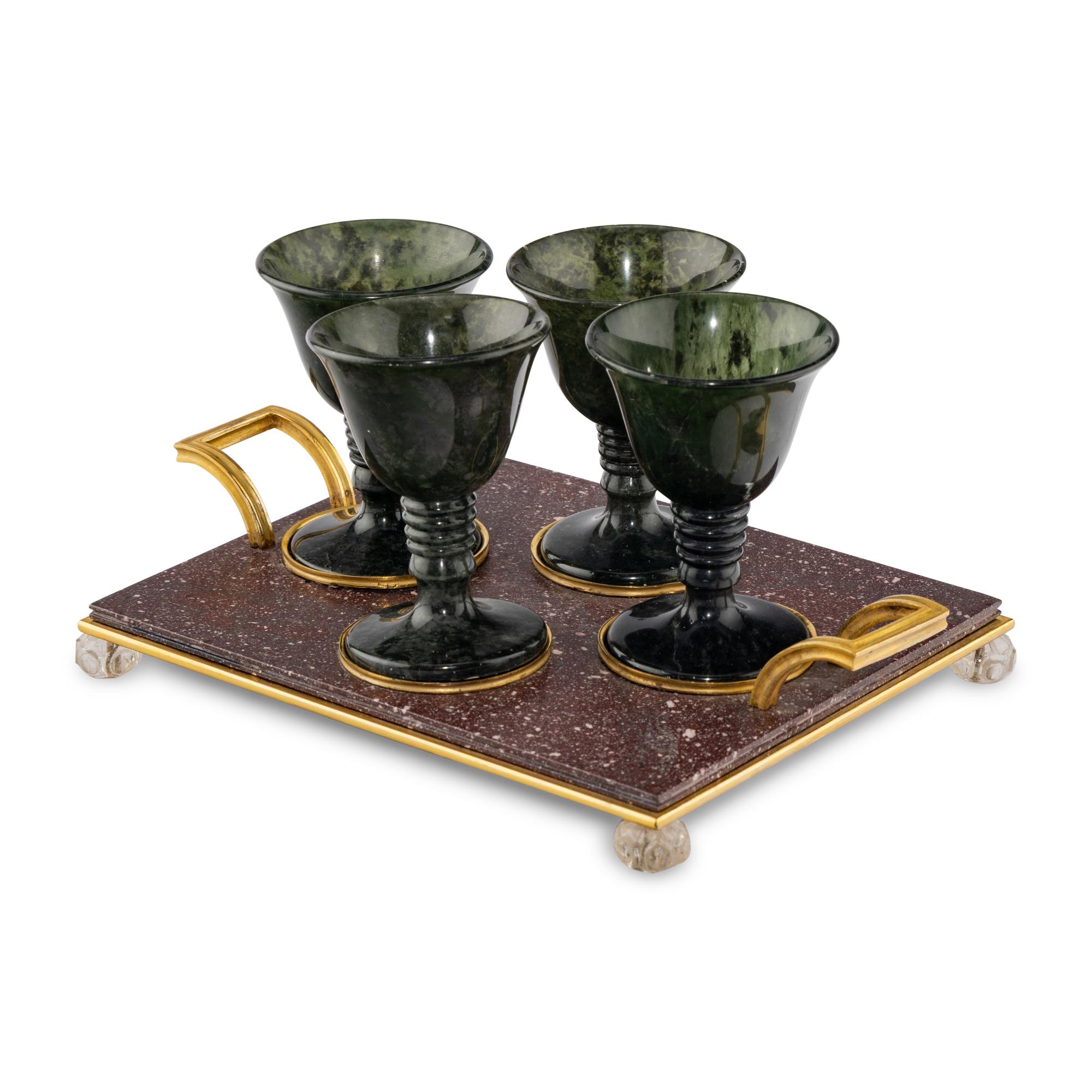 A Gilt Bronze Mounted Porphyry and Spinach Jade Cordial Set