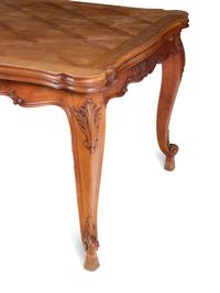 A Louis XV Style Parquetry and Walnut Extension Dining Table