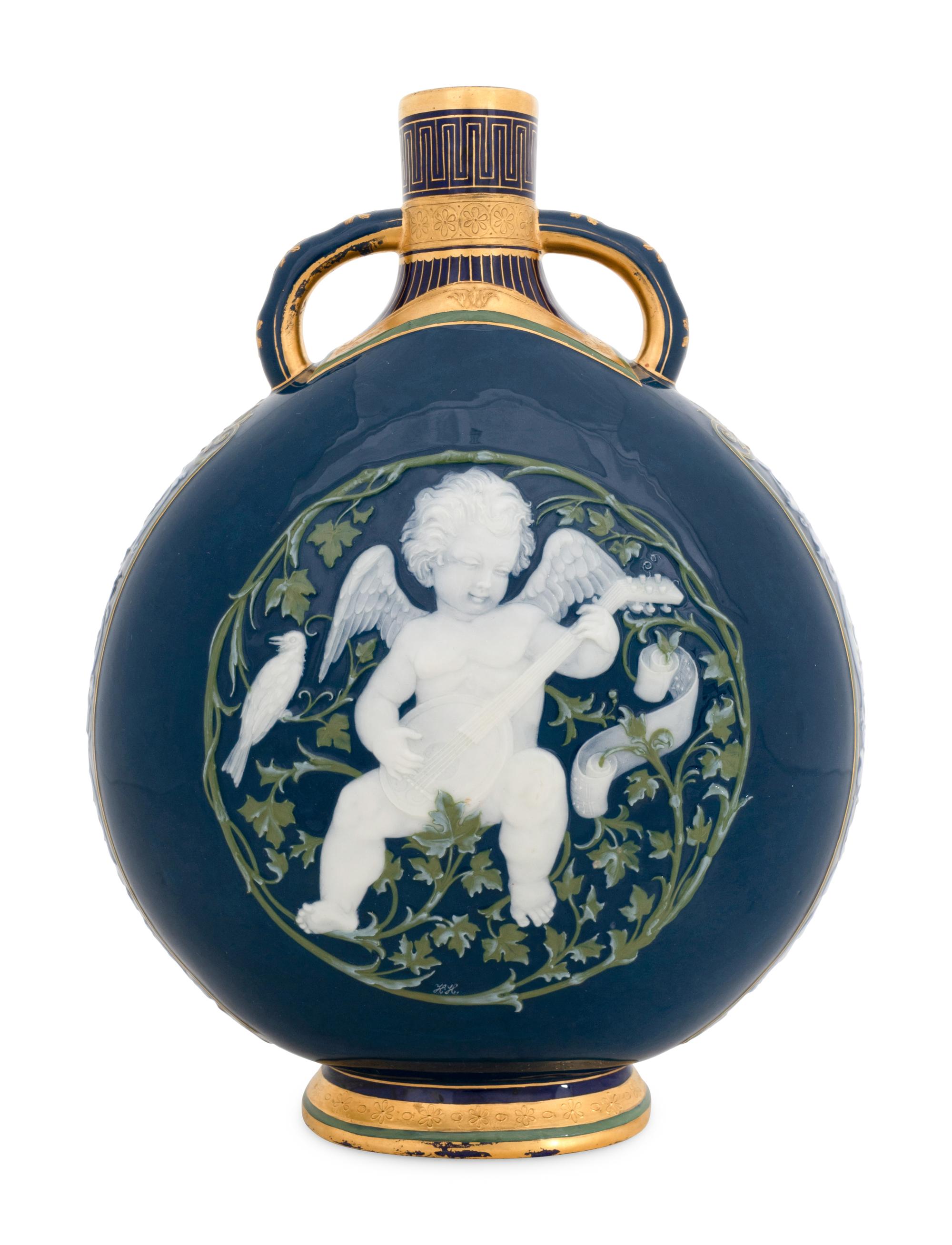 A Mintons Pâte-sur-Pâte Peacock Blue-Ground Bottle Vase