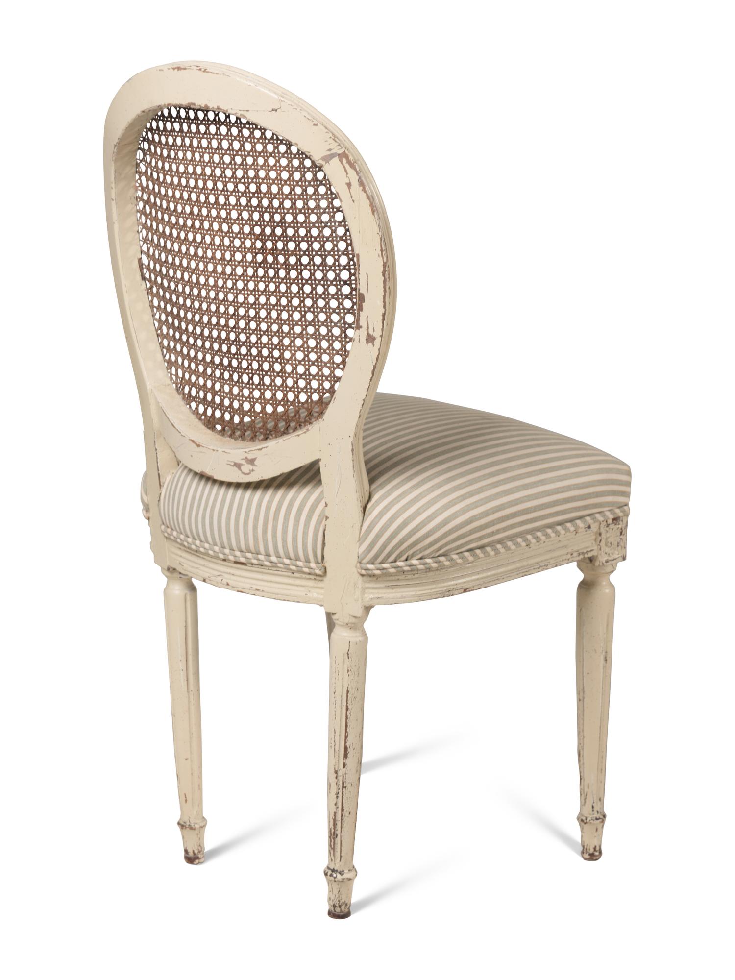 A Set of Six Louis XVI Style White-Painted Dining Chairs