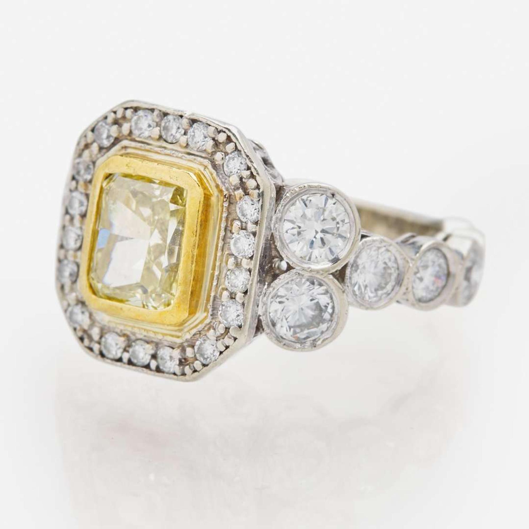 A 14K White Gold, Diamond, and Colored Diamond Ring 1.74 Carat Cut-Cornered Rectangular Modified Brilliant Yellow Diamond, GIA Certified