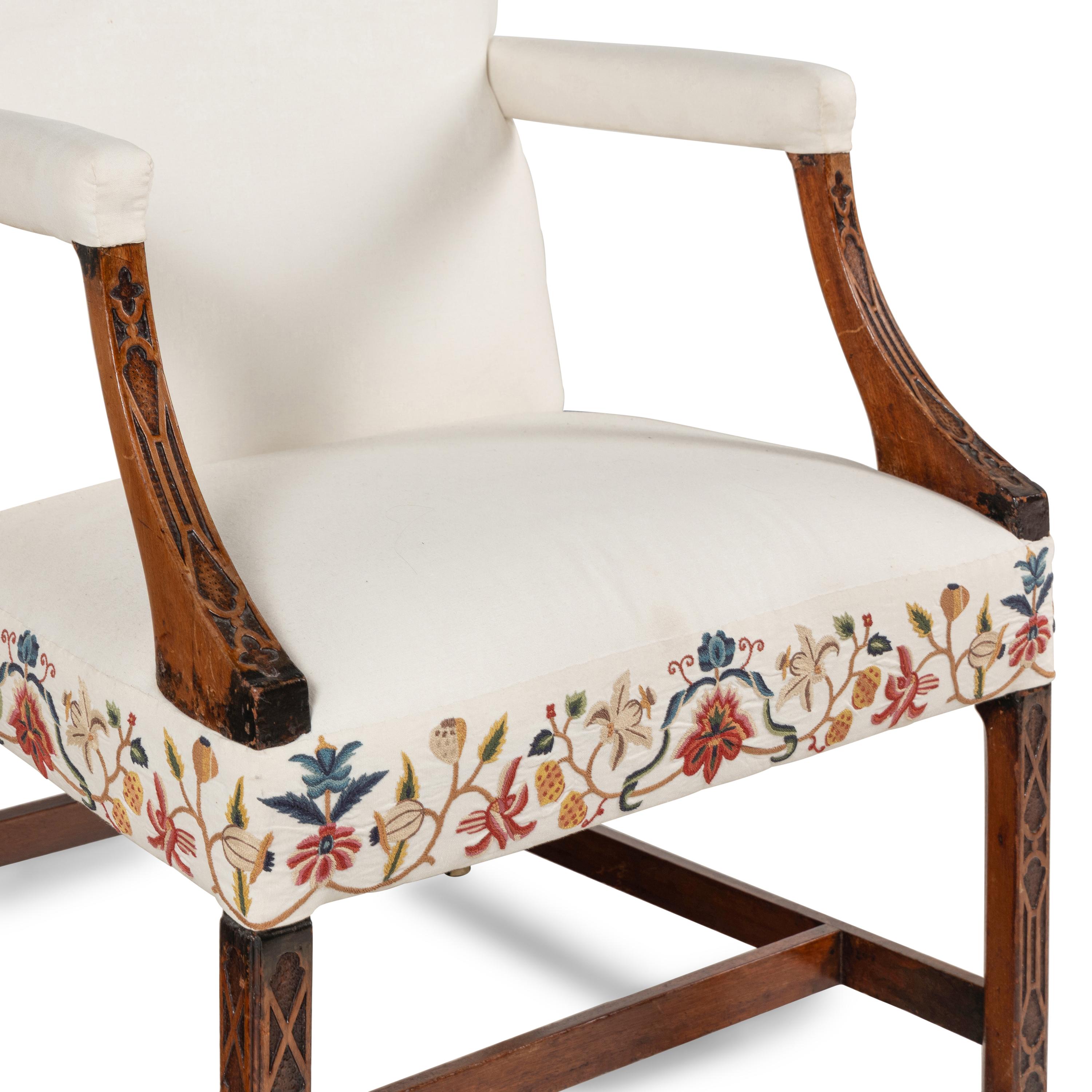 A George III Fret-Carved Mahogany Library Armchair