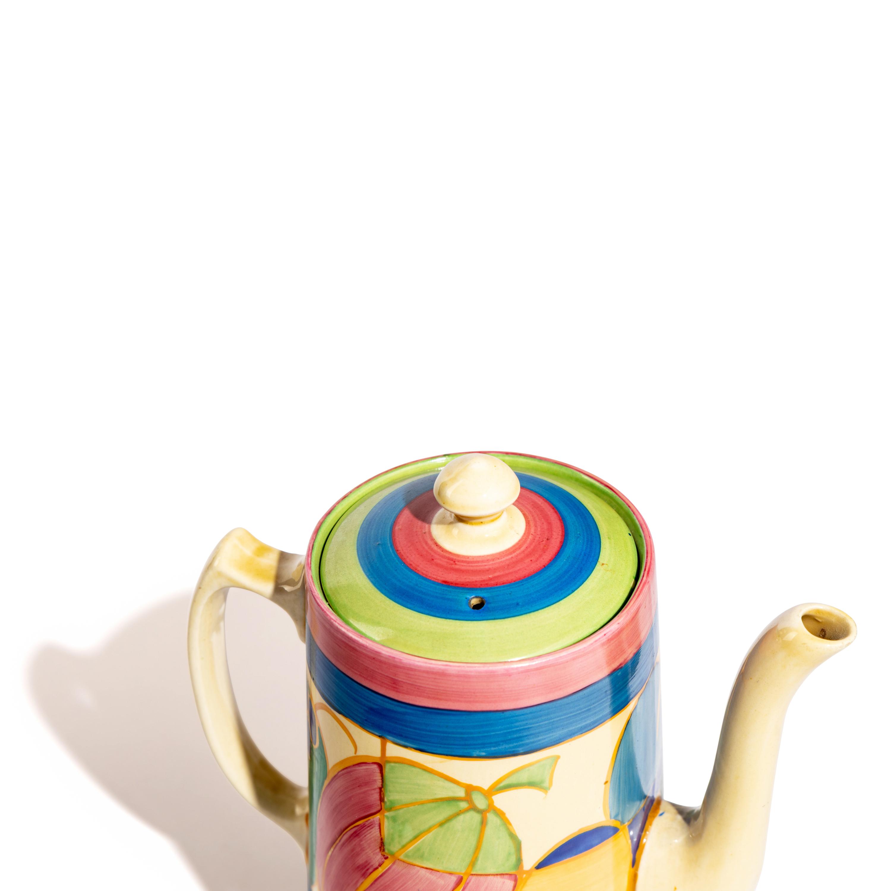 Clarice Cliff (English, 1899–1972) — Gibraltar pattern , 9 pieces and one Melon pattern Coffee Tankard