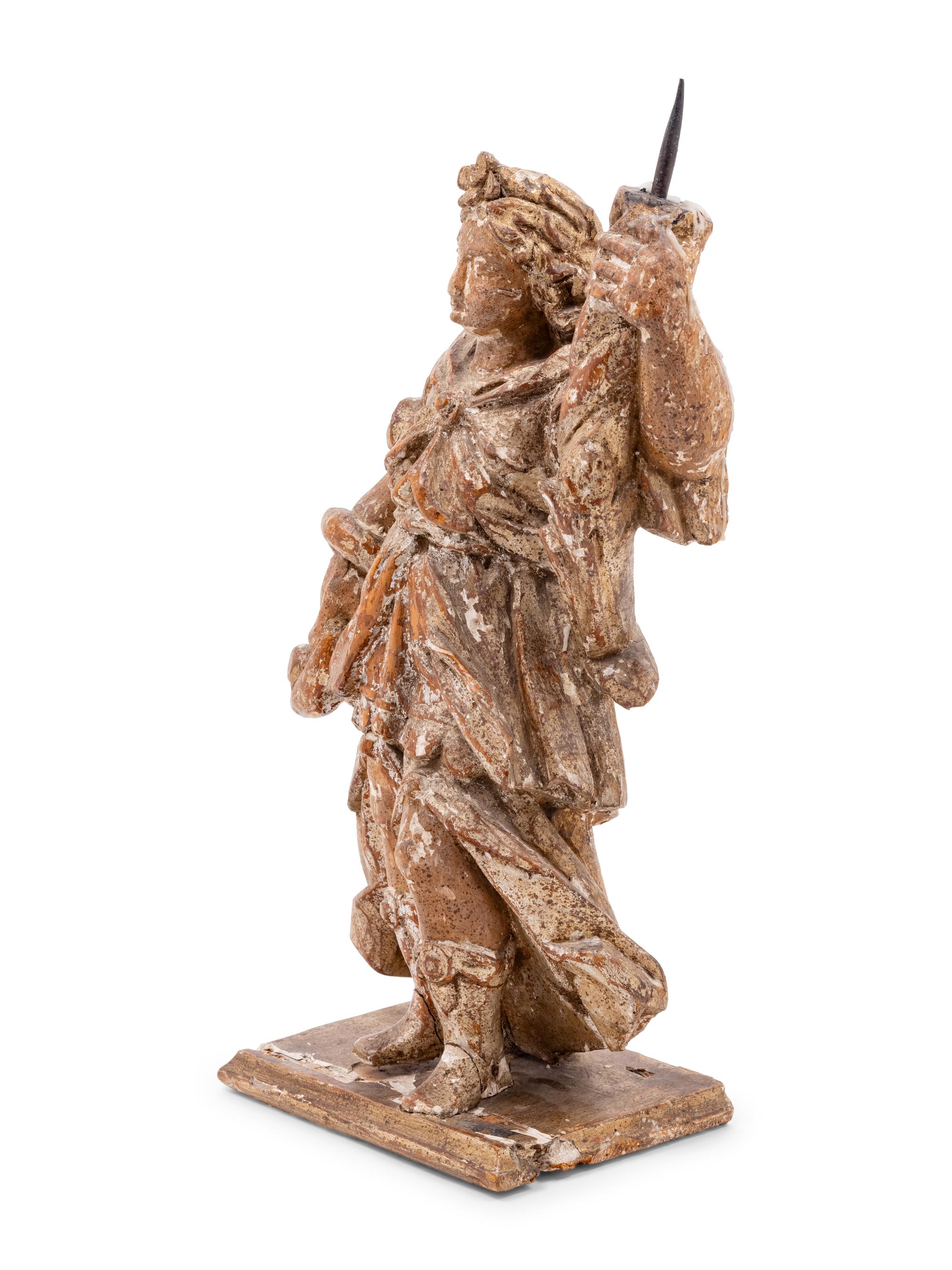 A Continental Carved Santo Figure with Remnants of Polychrome