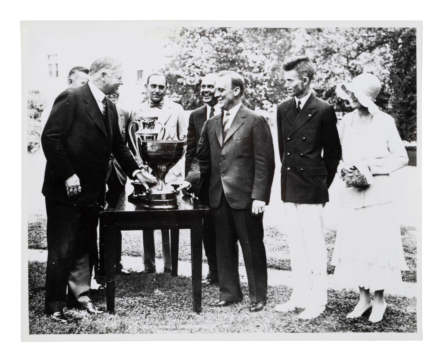 [PRESIDENTS] Photographs and ephemera related to Presidents Kennedy, FDR, Truman, and Reagan.