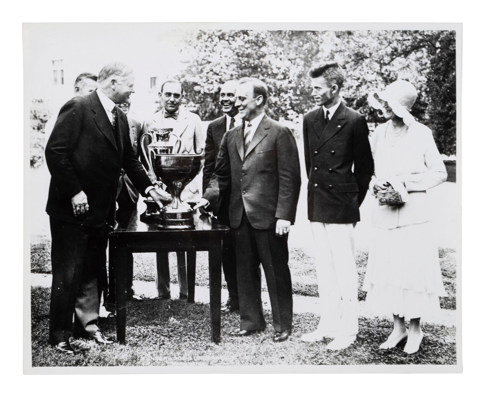 [PRESIDENTS] Photographs and ephemera related to Presidents Kennedy, FDR, Truman, and Reagan.