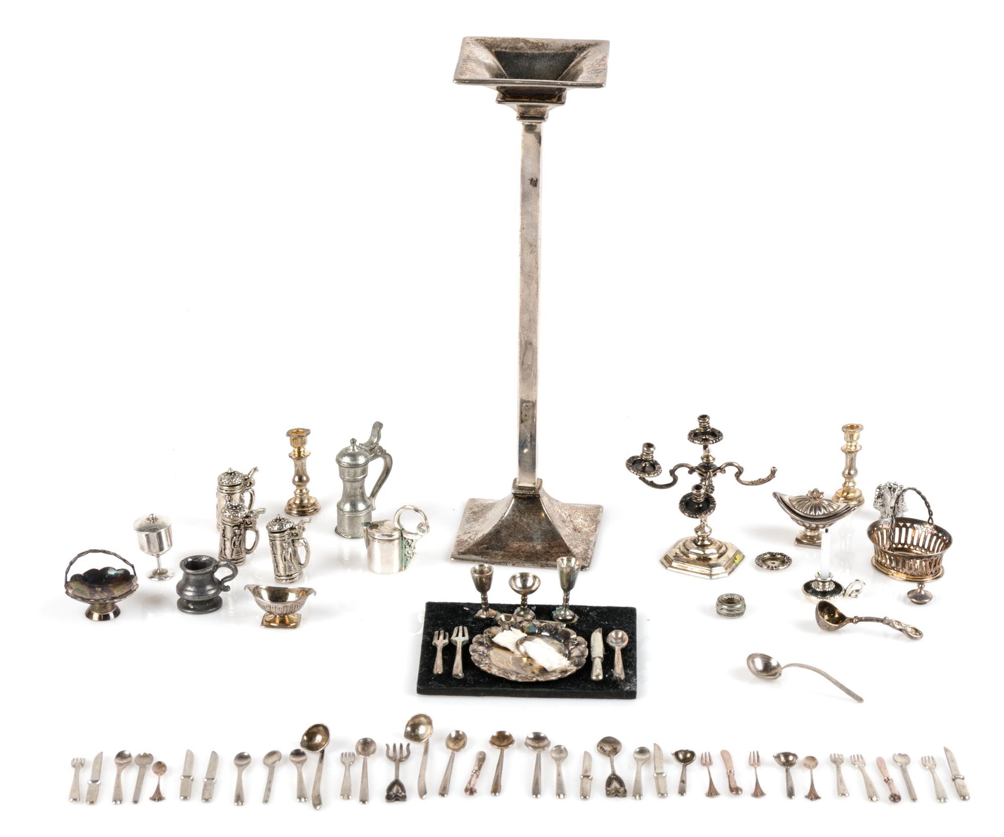 A Collection of Silver Table Articles, Various Makers, comprising an English four-light candelabrum; two baskets by William Gordon Blac