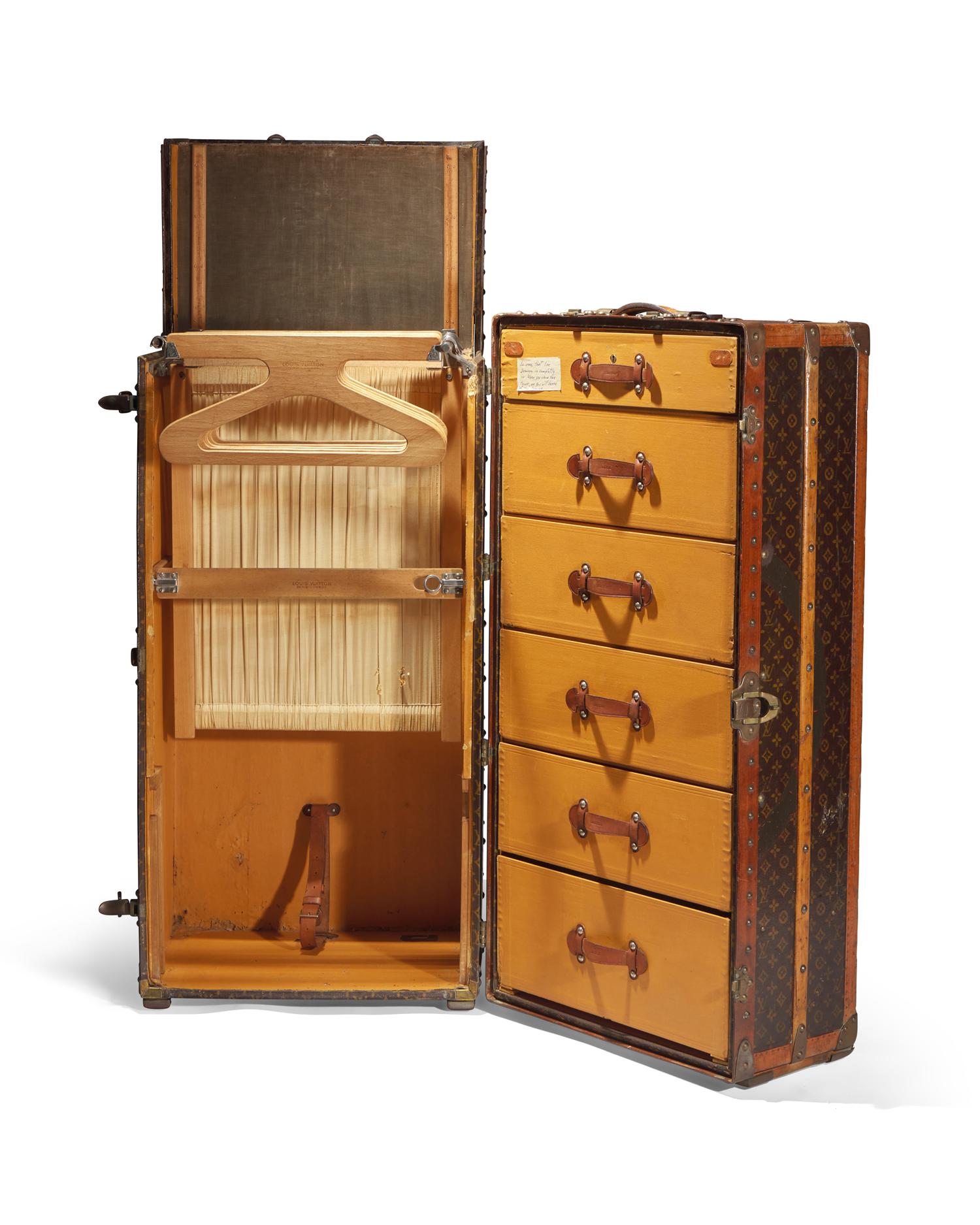 A Louis Vuitton Monogrammed Canvas Hardsided Wardrobe with 'JG' Monogram