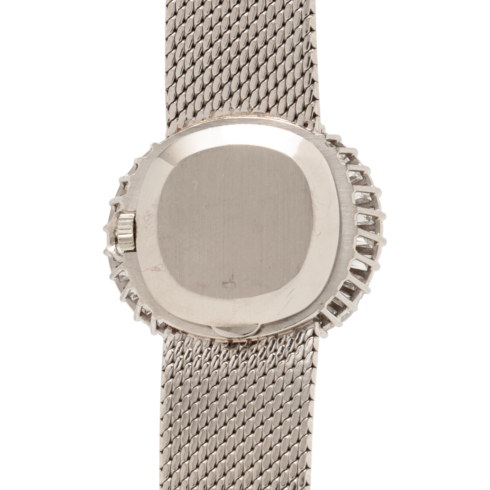 PATEK PHILLIPE, WHITE GOLD AND DIAMOND WATCH RETAILED BY AND SIGNED GÜBELIN