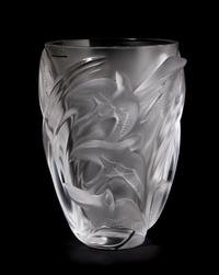 A Lalique Molded and Frosted Glass Vase, Height 9 7/8 inches.