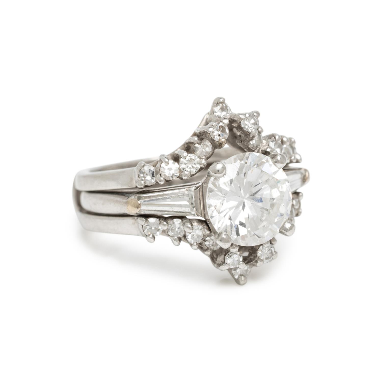 DIAMOND AND PLATINUM RING WITH JACKET