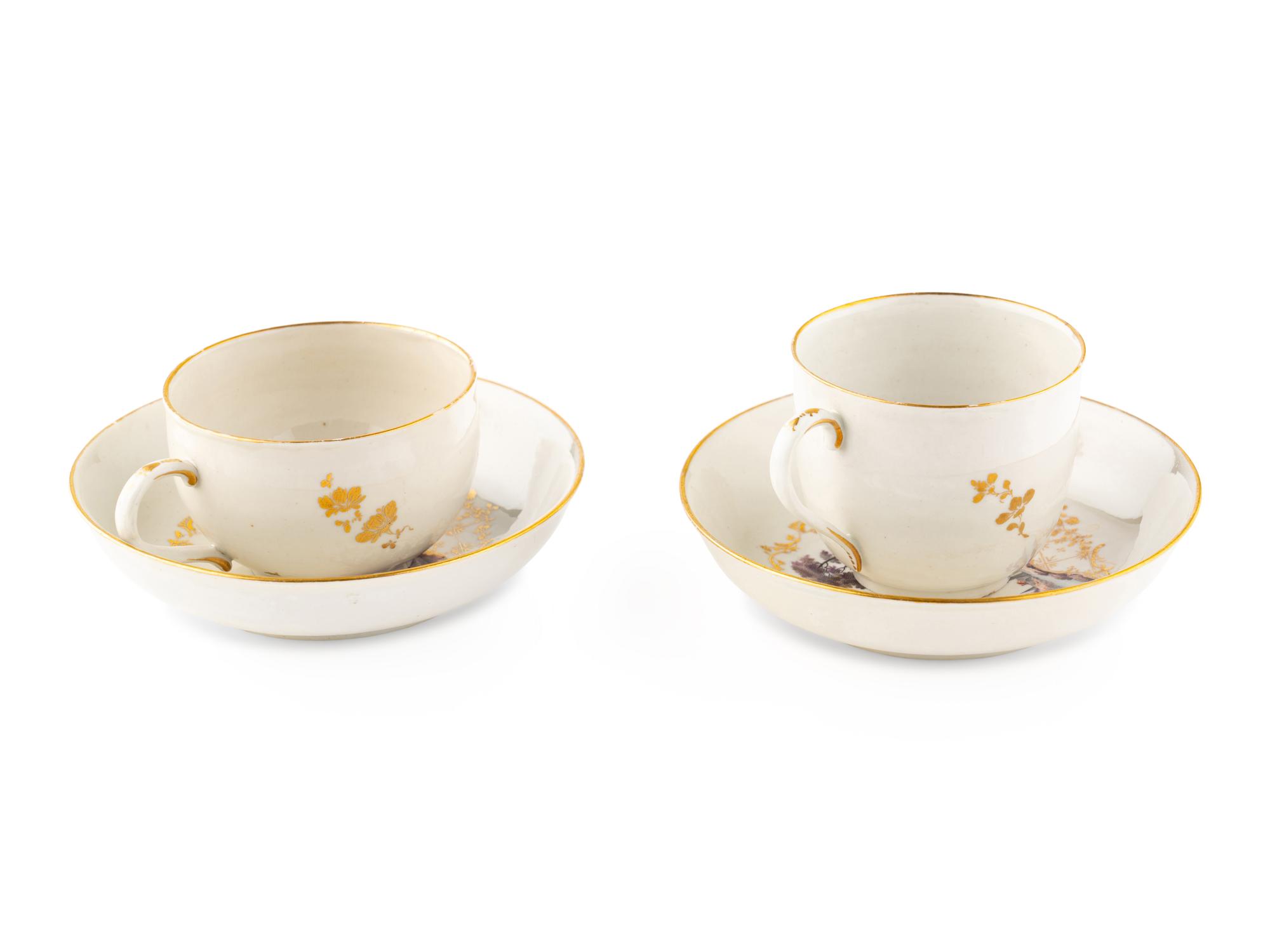 A Near Pair of South Italian Porcelain Teacups and Saucers