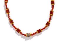 A Near Eastern Carnelian, Banded Agate, and Gold Bead Necklace