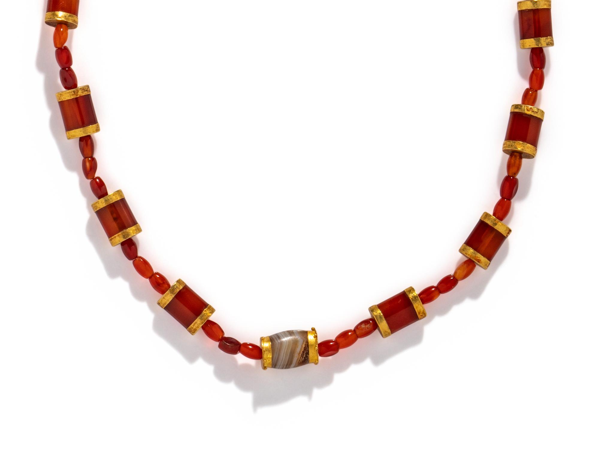 A Near Eastern Carnelian, Banded Agate, and Gold Bead Necklace
