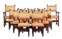 A Set of Fourteen Spanish Baroque Style Walnut Dining Chairs Height of armchair 46 1/4 inches.