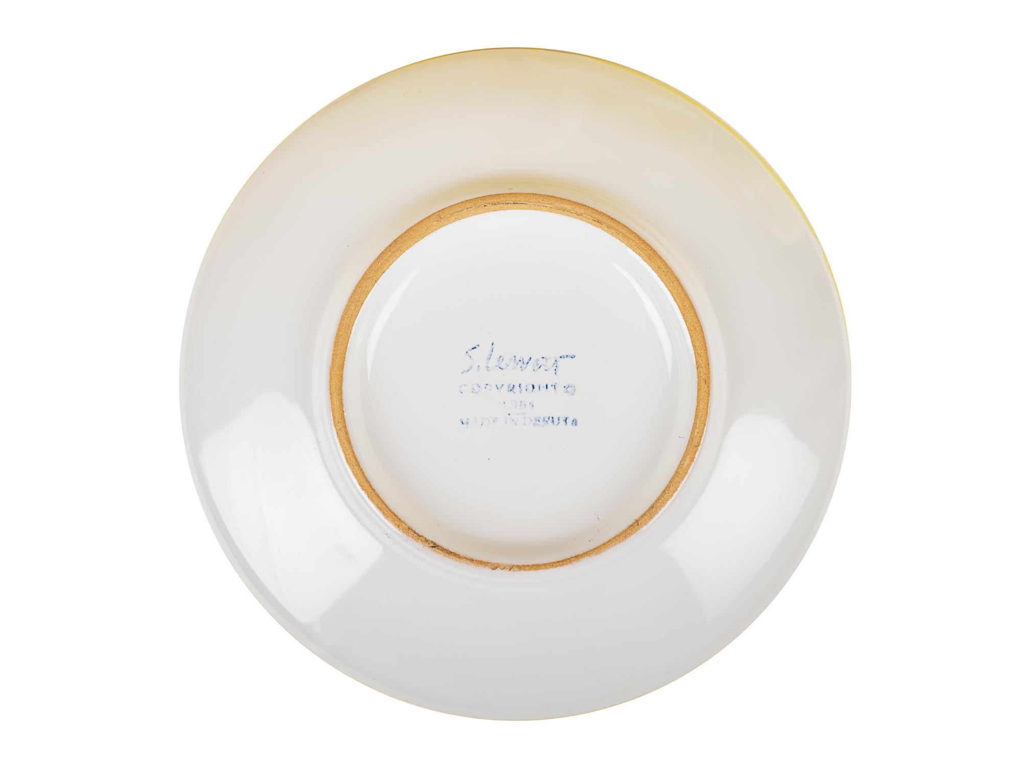 Collection of six cups and saucers, seven Stars Series plates, and one round platter