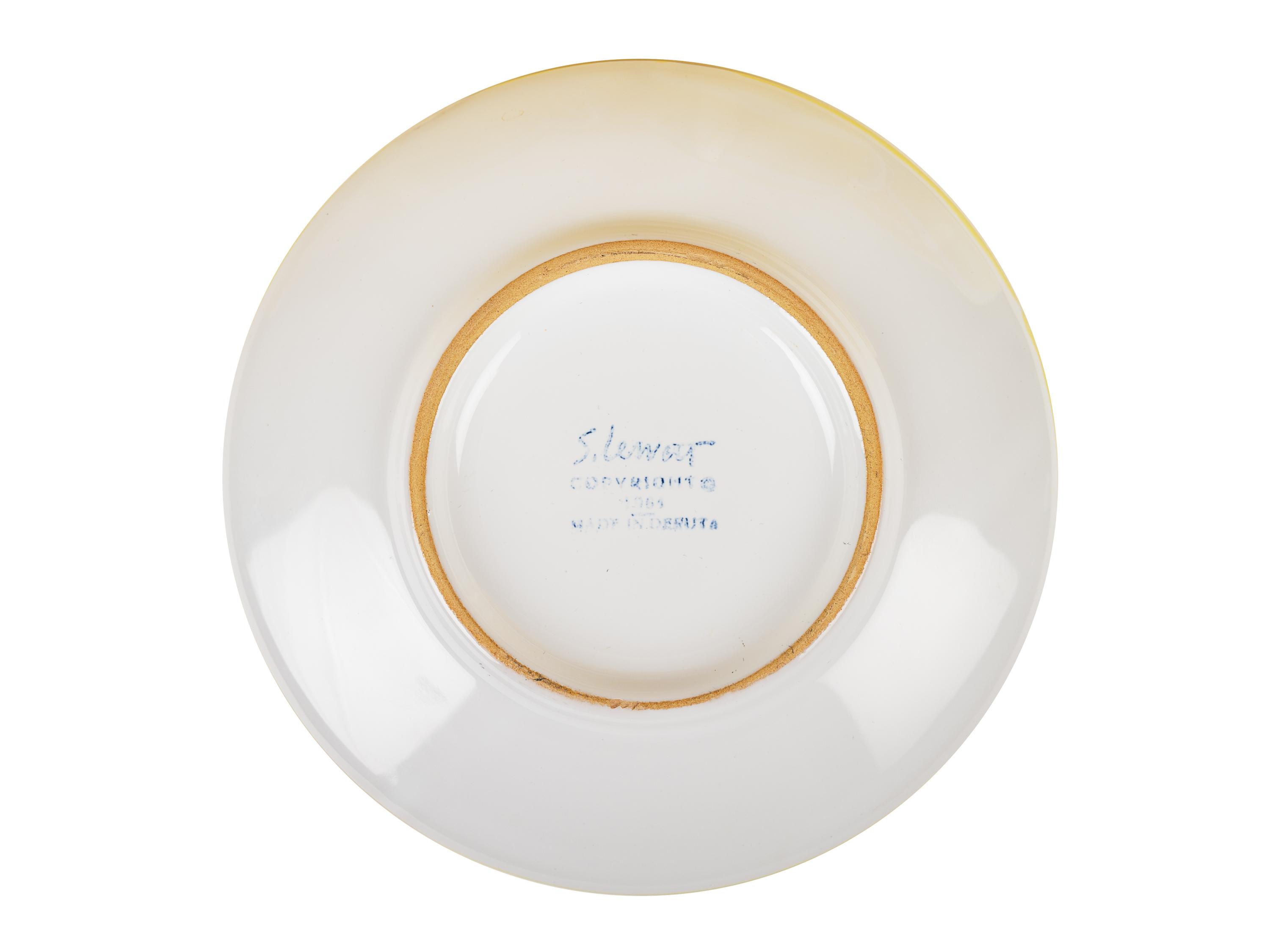 Collection of six cups and saucers, seven Stars Series plates, and one round platter