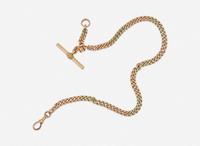 A Two-Tone Gold Pocket Watch Chain