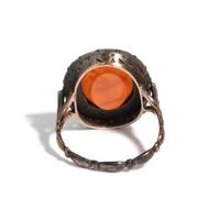 A Neoclassical Silver and Carnelian Finger Ring with a Portrait Head of a Woman Inside a Halo of Diamonds