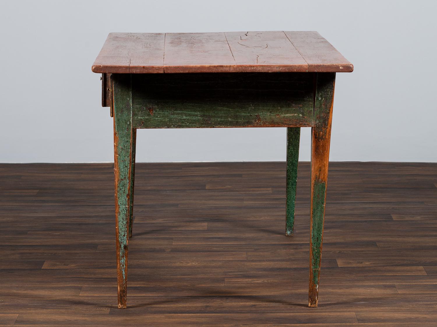 A Country Paint Decorated Pine Three-Drawer Farm Table