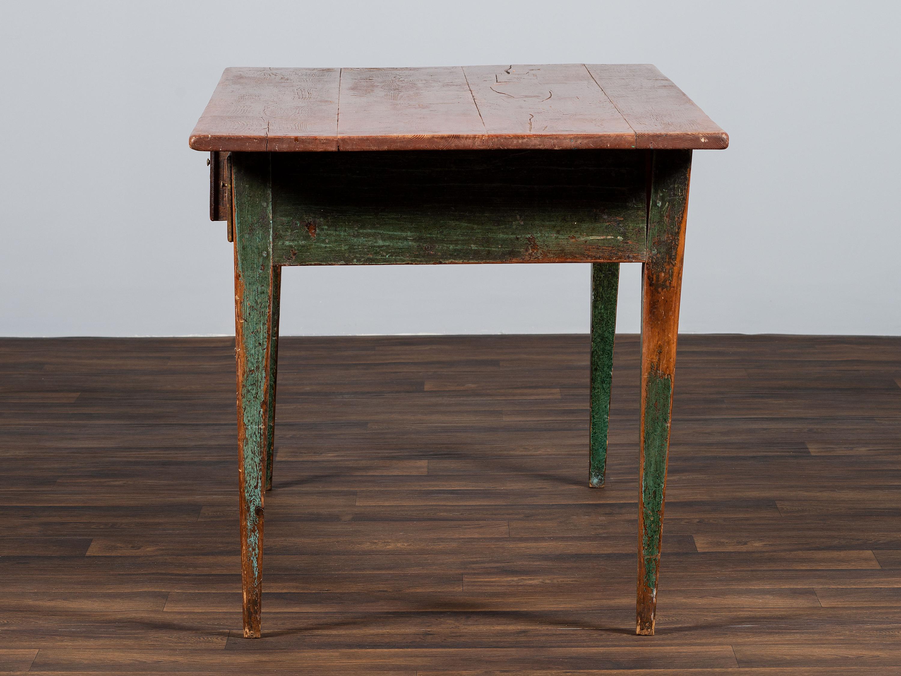 A Country Paint Decorated Pine Three-Drawer Farm Table