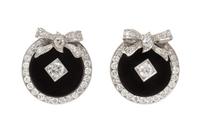 A Pair of Platinum, Diamond and Onyx Earclips, 8.70 dwts.
