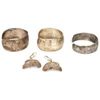 Northwest Coast Etched Figural Silver Cuff Bracelets and Earrings
