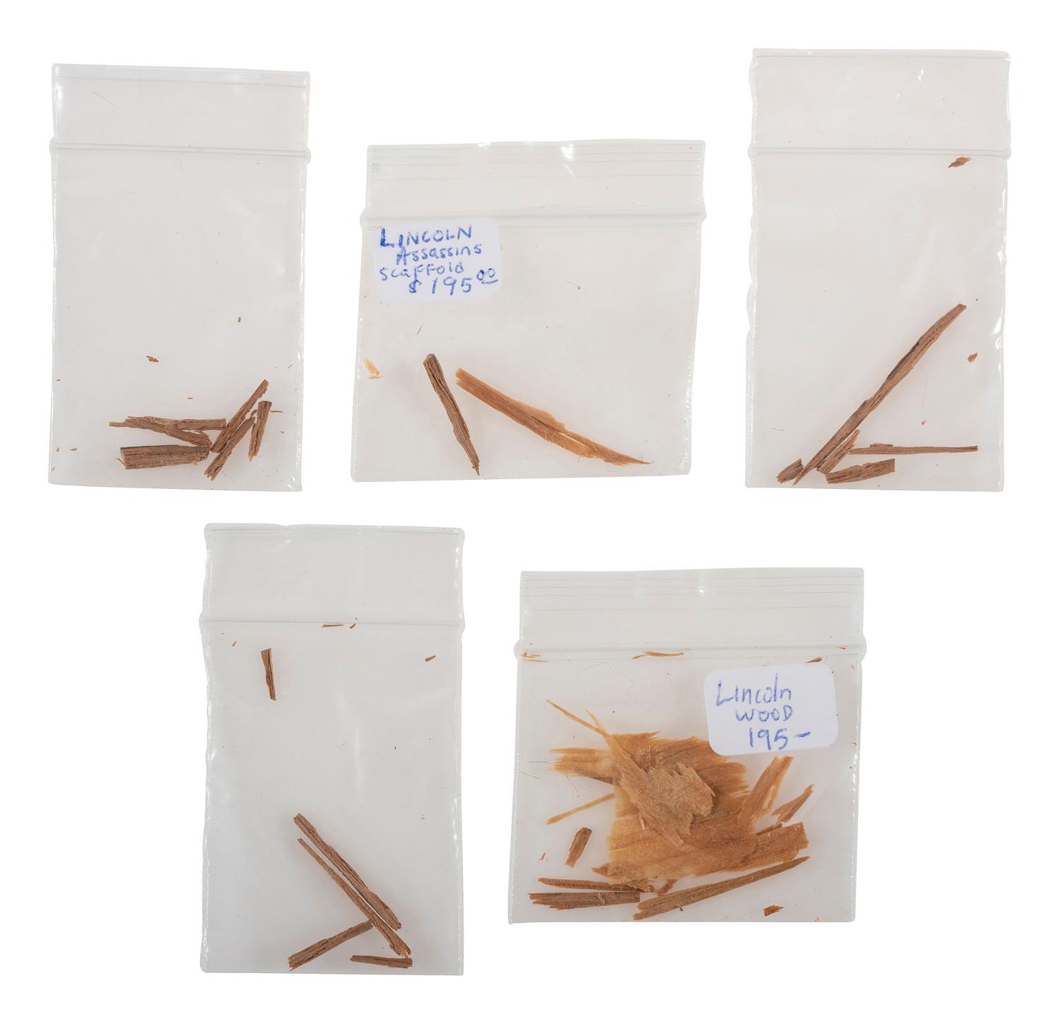 [LINCOLN, Abraham (1809-1865)]. Lincoln relics incl. strands of hair, wallpaper, and wood fragments.