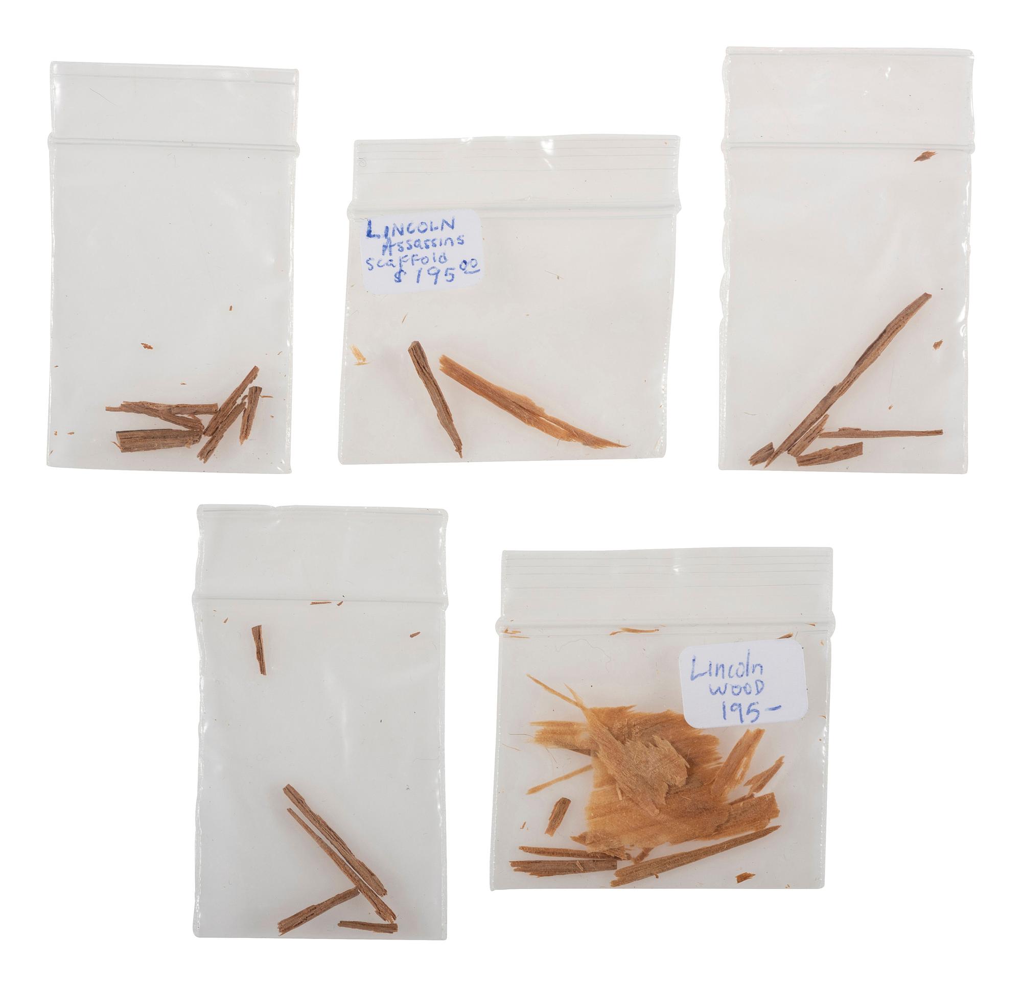 [LINCOLN, Abraham (1809-1865)]. Lincoln relics incl. strands of hair, wallpaper, and wood fragments.