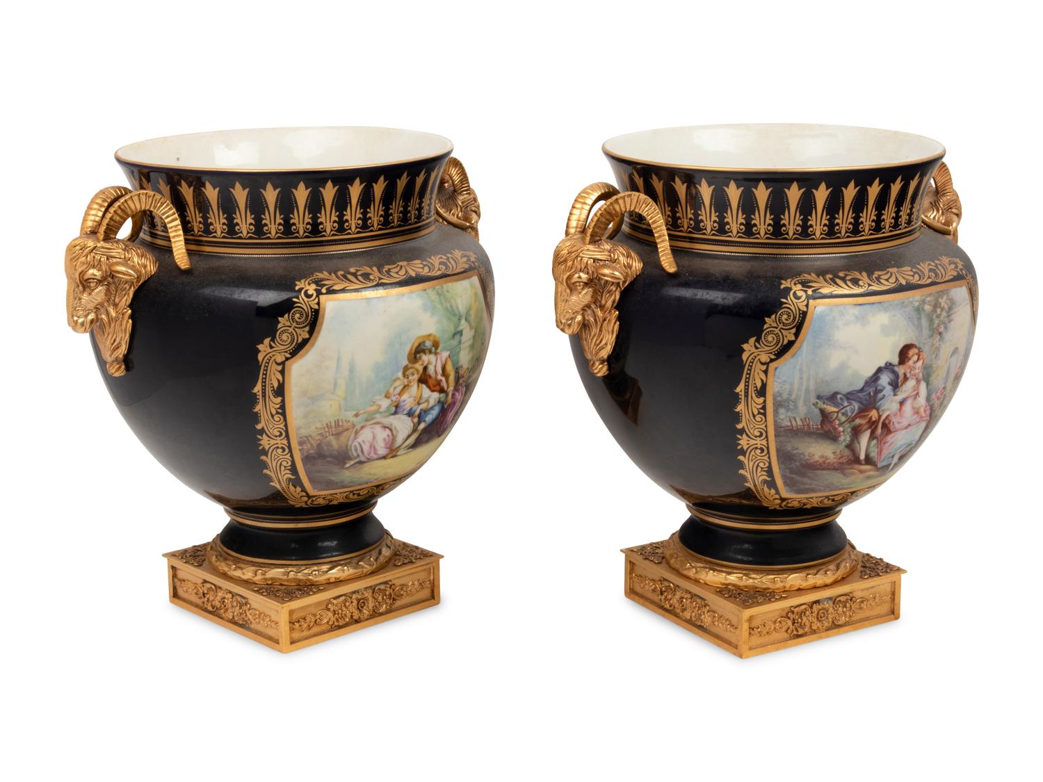 A Pair of Sèvres Style Gilt Bronze Mounted Porcelain Vases