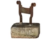 A Wrought Iron Boot Scrape with Stone Base