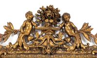 An Italian Baroque Giltwood Mirror