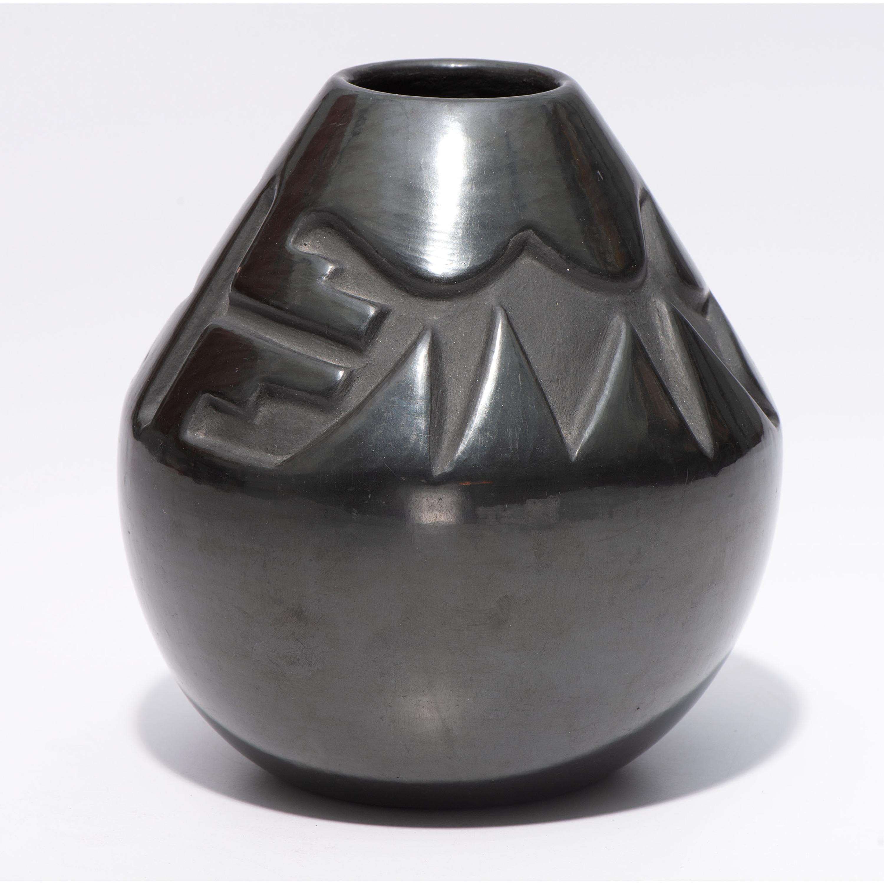 Deeply Carved Blackware Vase
