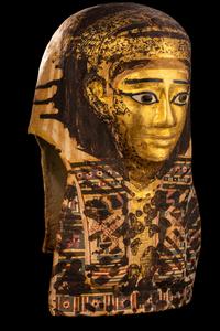 An Egyptian Gilt Cartonnage Mummy Mask