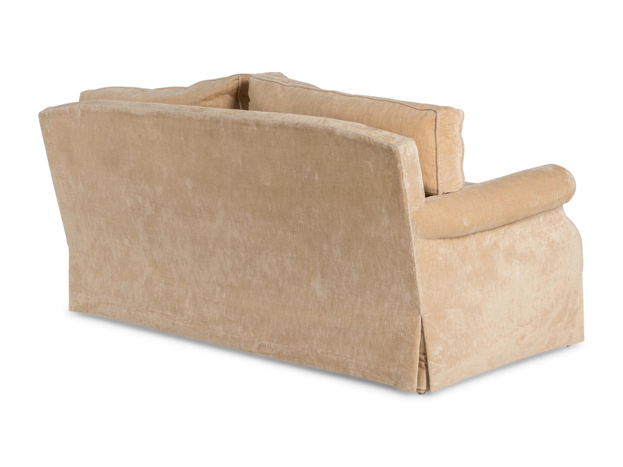 A Contemporary Velvet-Upholstered Two-Cushion Sofa