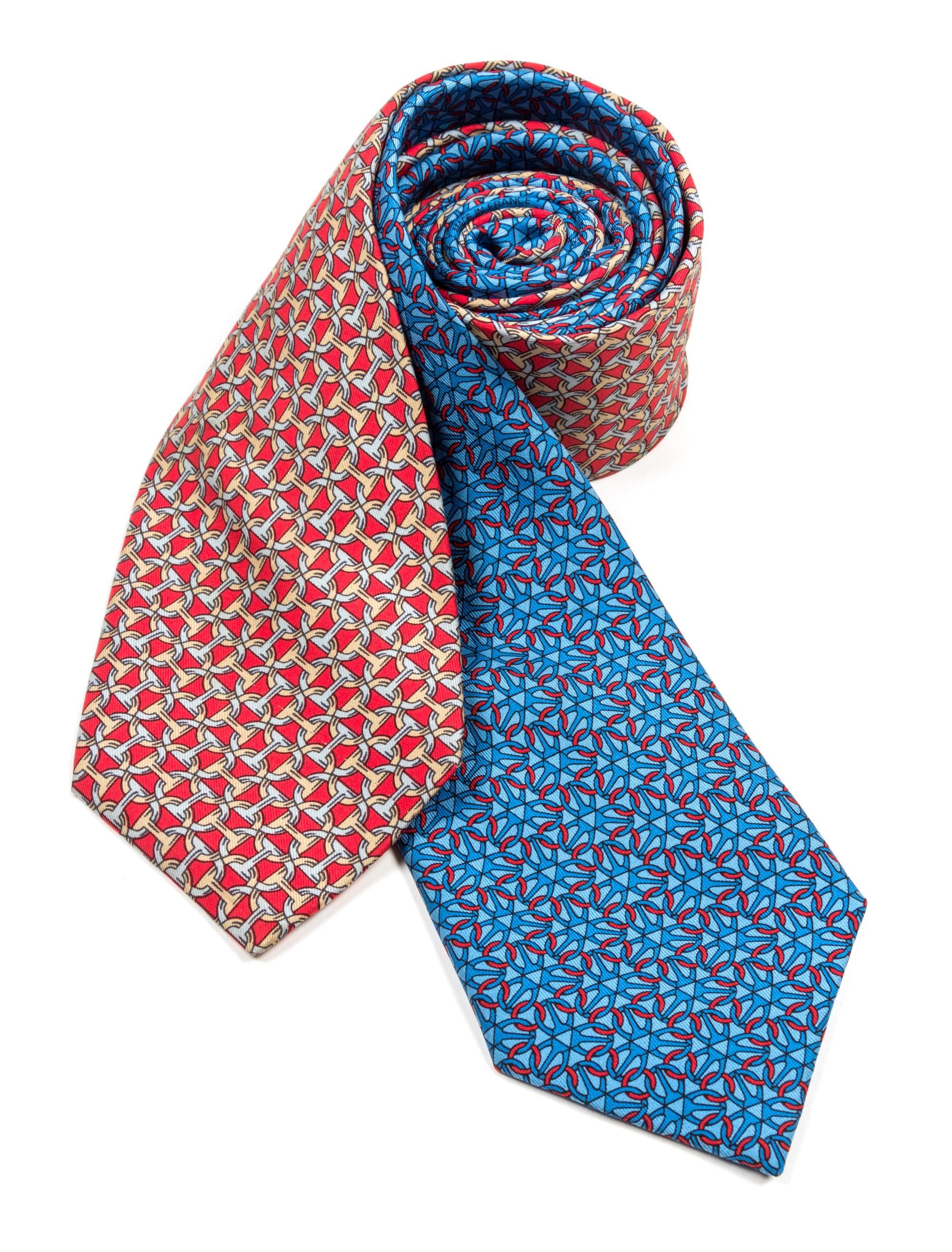 A Group of Two Hermes Silk Ties, 3.15" wide.