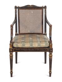 A George III Painted and Parcel-Gilt Caned Armchair