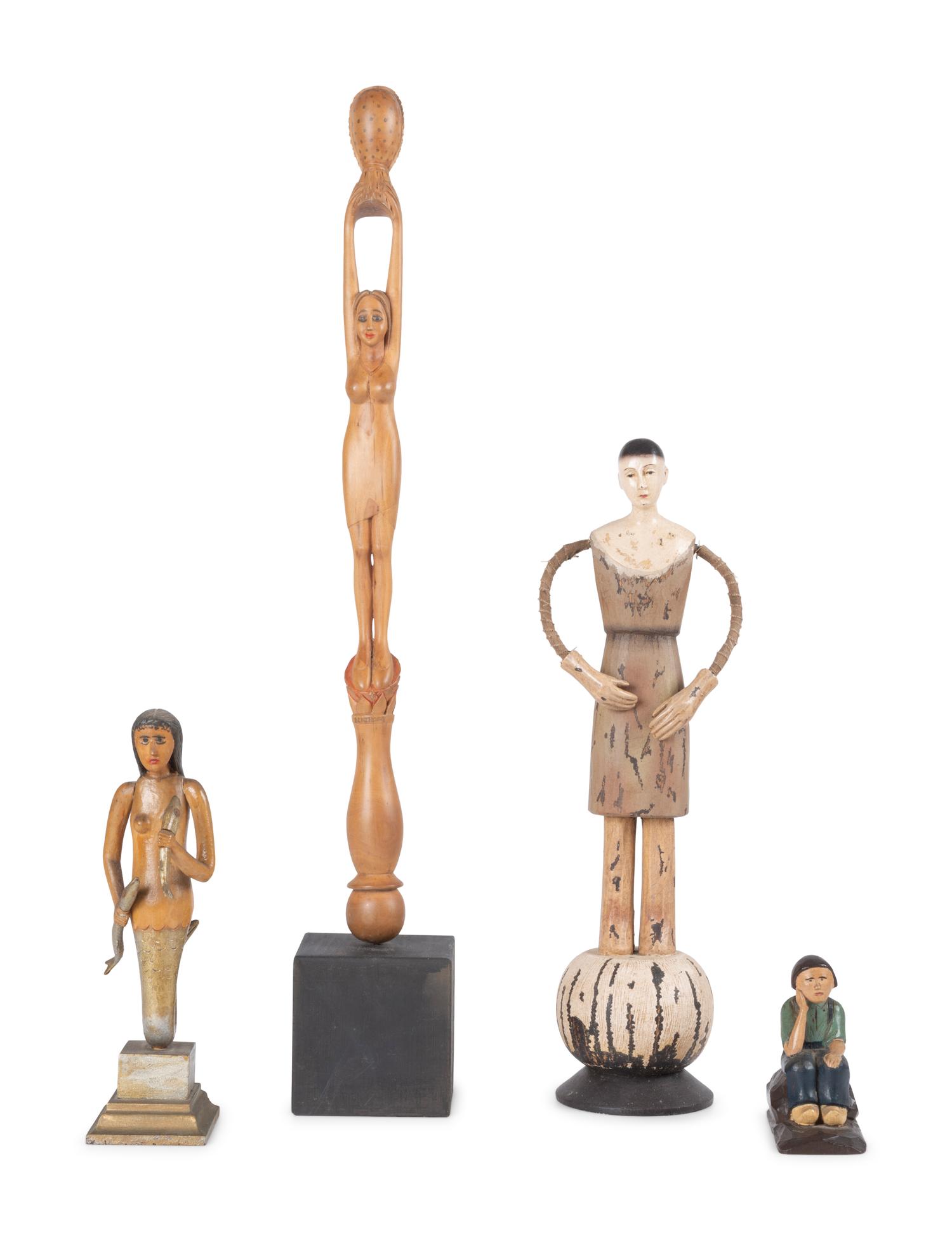 Four Carved and Painted Wooden Folk Art Figures