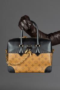 Louis Vuitton City Malle Handbag